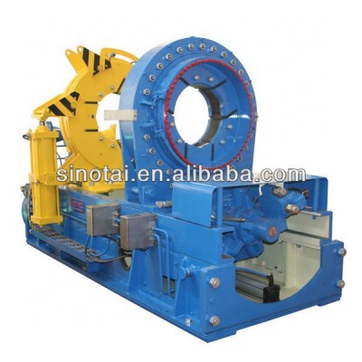 TJA casing and tubing hydraulic coupling bucking unit